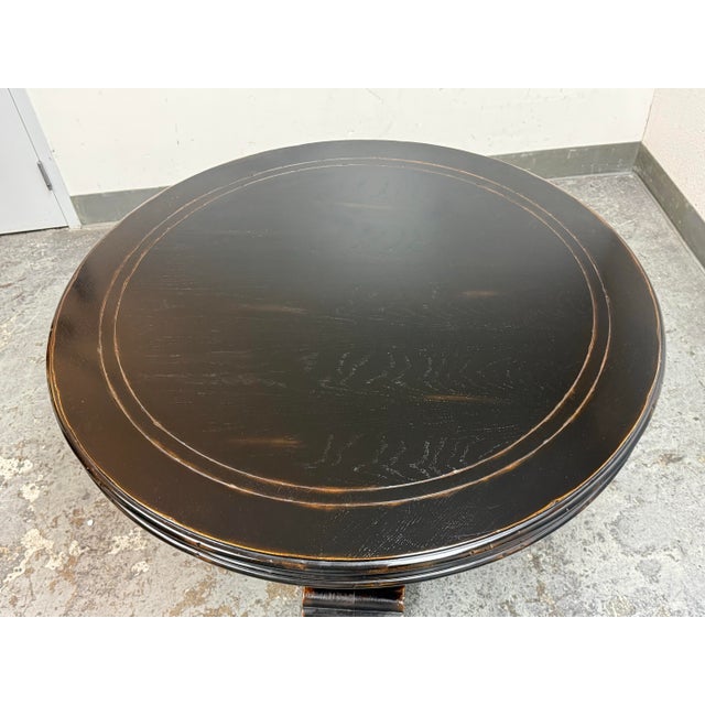 Design Plus Gallery presents an Aspen Round Dining Table by Eastern for The Furniture Co. This round dining table has an...
