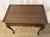Bring timeless elegance to your space with this classic Queen Anne style tea table from the highly collectible Ethan Allen...