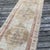 A Softly Aged Vintage Runner from Kars This vintage runner rug from Kars, Turkey, offers a timeless blend of strong...