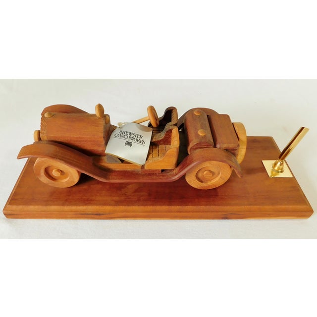 Wonderful vintage Brewster Coachworks handcrafted wood vintage car pen holder desk set. Handcrafted using five different...