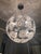 Murano glass disc light fixture. 6 lights on the inside 60W each. Approximately 17" of cord from the canopy and the...