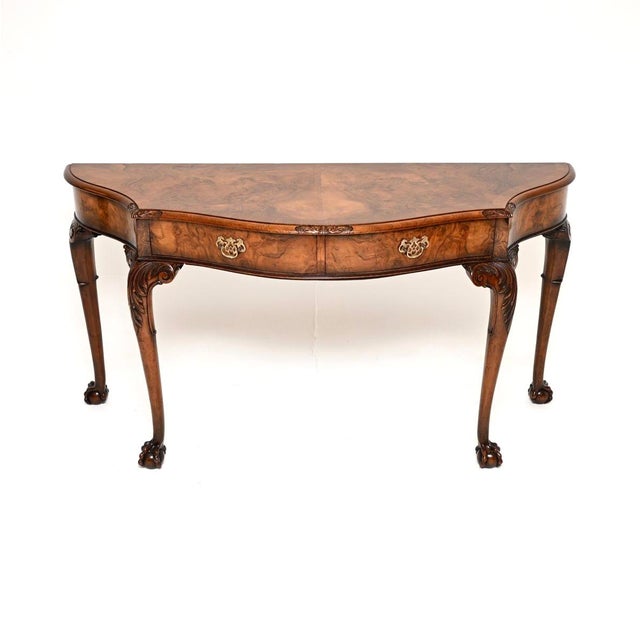 A beautiful and large antique Queen Anne style figured walnut console table. This was made in England, it date from around...