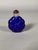 Snuffbox with a gourd motif, made of blue Peking glass with a translucent neck, China, 20th century . Red glass stopper...