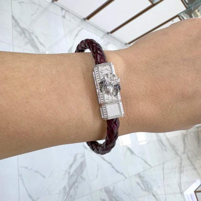 Brand: Sword Limited Gender: Unisex Metal Type: 18K White Gold & Titanium Length: 6.00 inches Width: 10.35 mm Weight:...