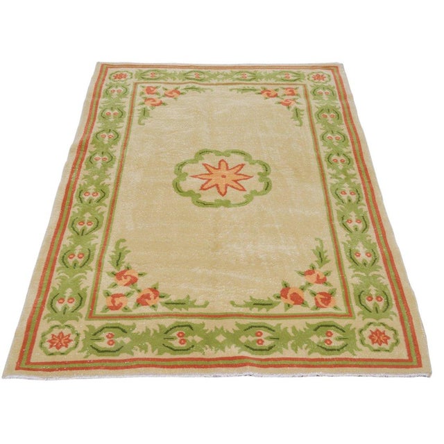 Hand-knotted with care using traditional rug-making techniques, this wool rug blends timeless craftsmanship with a modern...