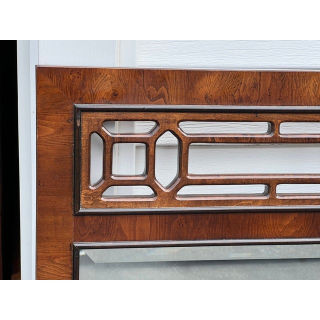 This vintage Mid-Century Modern wall mirror, crafted by Hickory White, is a stunning reflection of the design aesthetics...