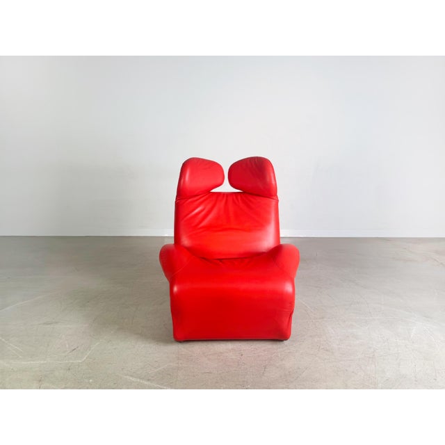 We are offering a beautiful Cassina Wink Chair in red for sale. This chair is considered a true design classic and...