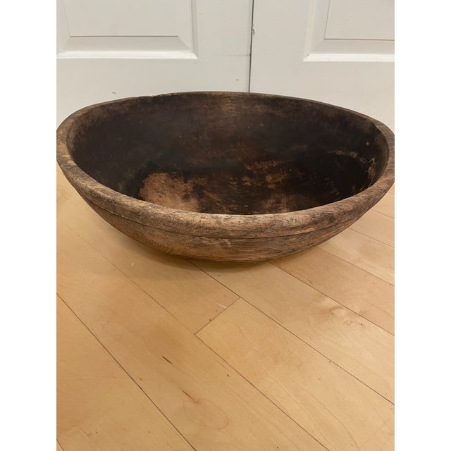 This product is a primitive antique large wooden handcarved bread dough bowl, made from wood. It features wonderfully worn...