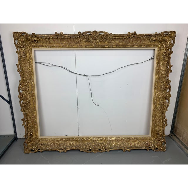 Antique gold ornate rococo style hand carved wood frame. From the collection of Bob and Dolores Hope from their estate...