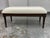 Design Plus Gallery presents an Upholstered Bench from Shermag. This bench has a cream textured fabric seat with a subtle...