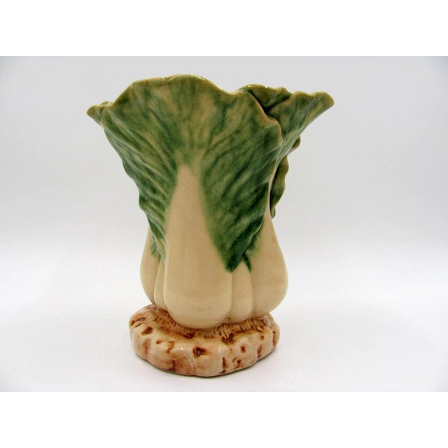 Thick and sturdy. No chips nor cracks Has a slight wobble. Crazing throughout, with some stained crazing. Discolored...