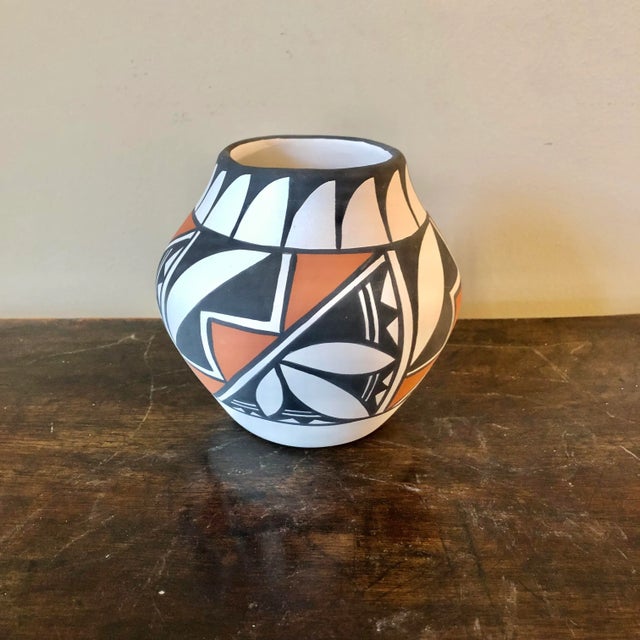 A pair of Pauline Abeita Acoma New Mexico pottery vases.