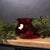 Add a bold pop of color and timeless elegance to your home with this Set of Red Glass Vases. Featuring a vibrant red hue...