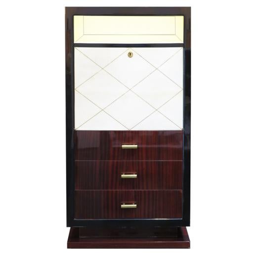 Secretary desk in Rosewood with high gloss finish. Parchment door with gold leaf criss cross design. Three Drawers with...