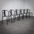 A rare set of six “maxmo” dining chairs produced by ikea in the 1980s, representing a bold and playful chapter in...