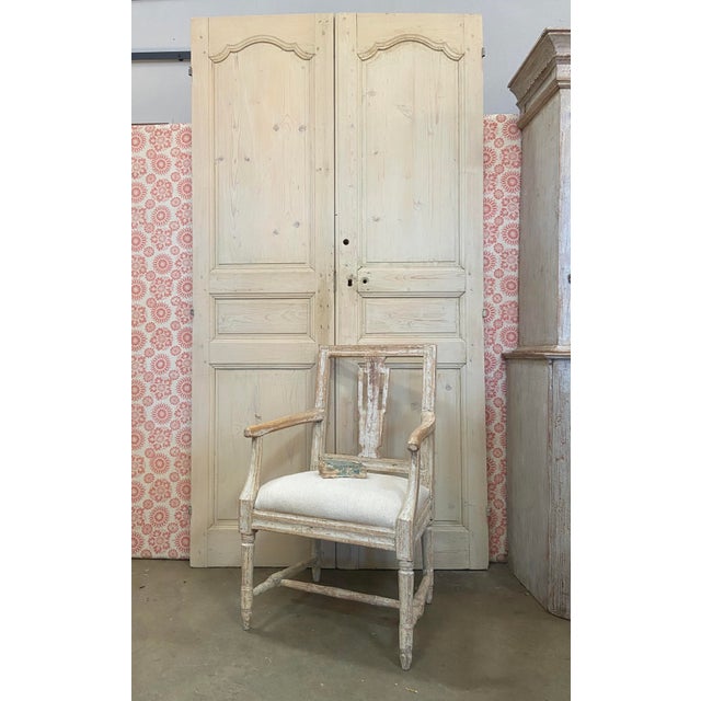 Great pair of 19th century French stripped pine doors. Lovely French scalloping on the top hardware not included. Original...