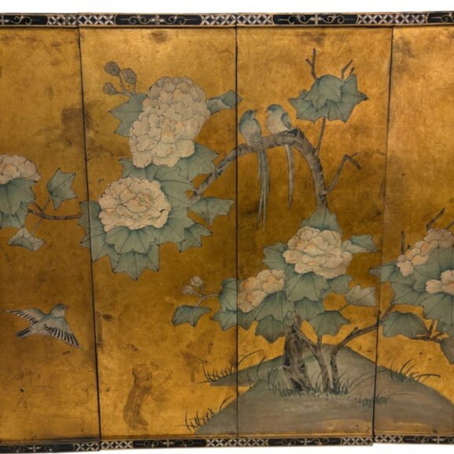 Decorative Japanese folding screen with four individual panels featuring a hand-painted scene depicting peonies and birds...