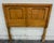 This is a vintage 1970s rustic-modern headboard featuring warm knotty pine veneers, rounded recessed panels, linear...