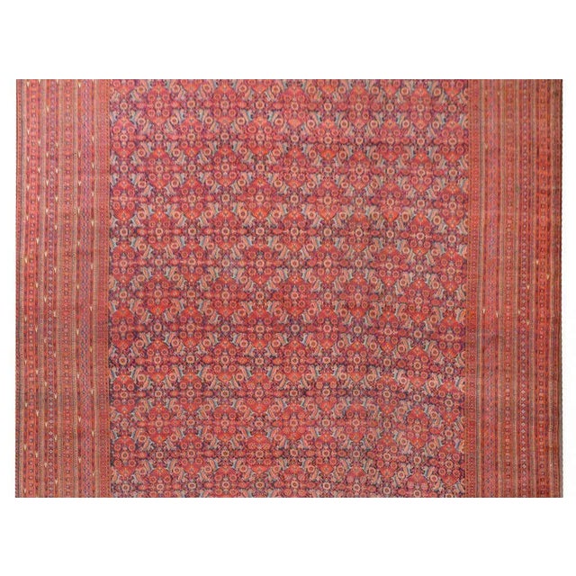 An outstanding early 20th century palatial-size Afghani Bashir rug with a rare and wonderful all-over floral and leaf...