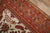 A late 19th century Turkish Oushak with an all over geometric design on an ivory color field. The border is a dark forest...