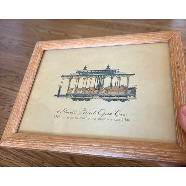 Charming vintage San Francisco cable car print depicting the historic Powell Street Open Car, with period details...