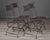 Set of Four French Iron Curule Side Chairs With Woven Strap Seats For Sale - Image 11 of 12