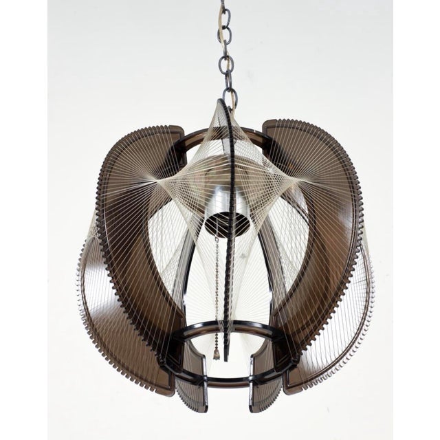 Striking mid-century pendant lamp designed by Paul Secon for Sompex. Featuring Secon’s signature string construction, with...