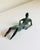 An abstract bronze modernist sculpture created in the distinctive style of the renowned British sculptor Henry Moore and...