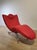 DS 151 chaise longue by Jane Worthington for the Swiss company De Sede. The chair has a metal frame and a red faux leather...