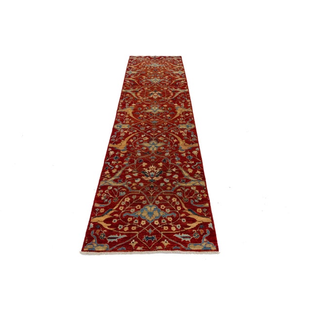 Introducing a stunning modern Sultanabad hand-knotted wool runner, featuring a rich red field. This beautifully crafted...