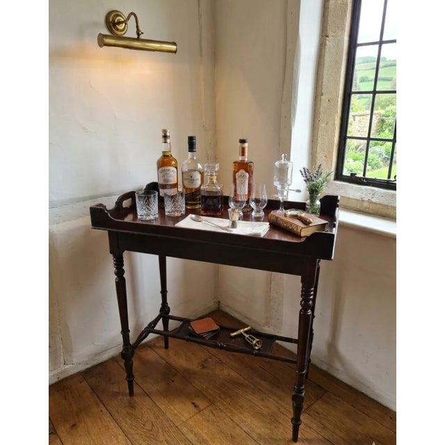 Wonderful mahogany tray on stand, dating to circa 1900 and made in the earlier 18th-century taste, in the Chippendale...