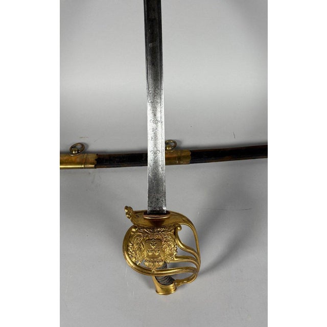 King's bodyguard saber, 1st model.Shagreen-covered hilt with filigree. Gilt brass mount, four- branch guard, and shell...