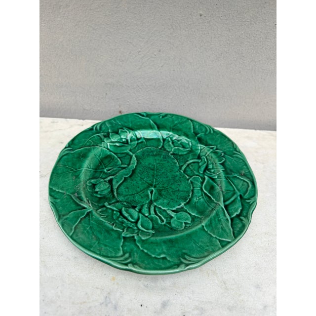 English green Majolica water lily plate, Circa 1890. 7.5 inches diameter.