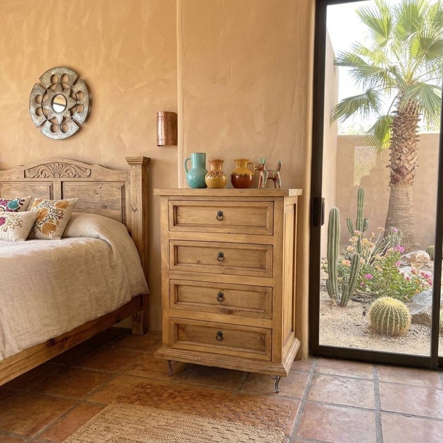 This exquisite four-drawer rustic storage chest, crafted from solid Ponderosa pine with a weathered honey finish, embodies...