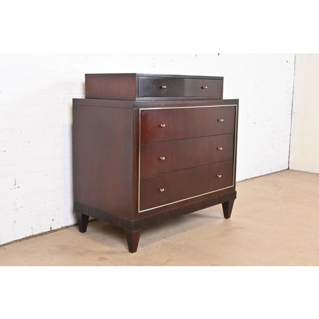 A gorgeous Modern Regency style dresser or chest of drawers by Barbara Barry for Baker Furniture. Mahogany, with nickel...