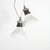 A pair of antique prismatic glass stiletto holophane pendant light shades. The light have retained their original...