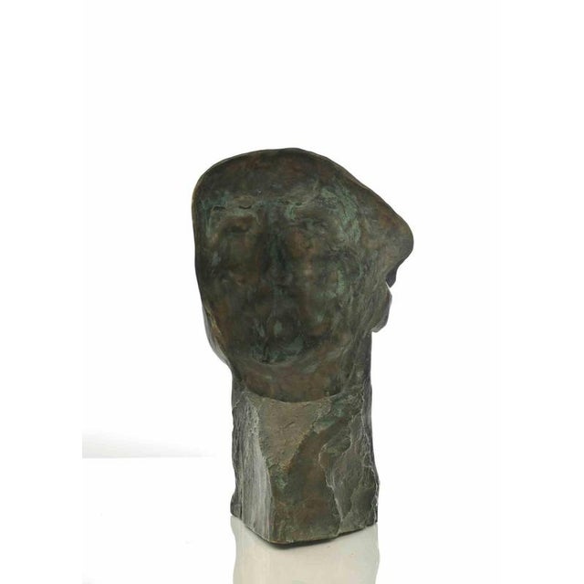 Head of man is an artwork realized by amedeo bocchi in 1920 ca. This little sculpture is made in gilded bronze with a...