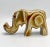 Mid century modernist carved fossil wood agate elephant. This 1960s piece is polished bright. The stone from a fossilized...