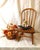 This vintage solid birch child-size Windsor hoop-back rocking chair beautifully captures the timeless elegance, storied...