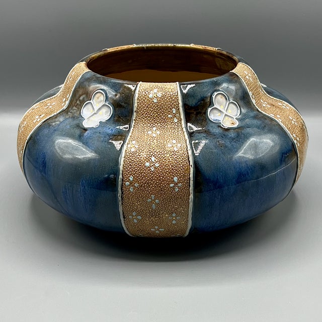 A finely crafted Royal Doulton Lambeth stoneware jardinière, dating to the early 20th century (c. 1902–1920). This wide,...