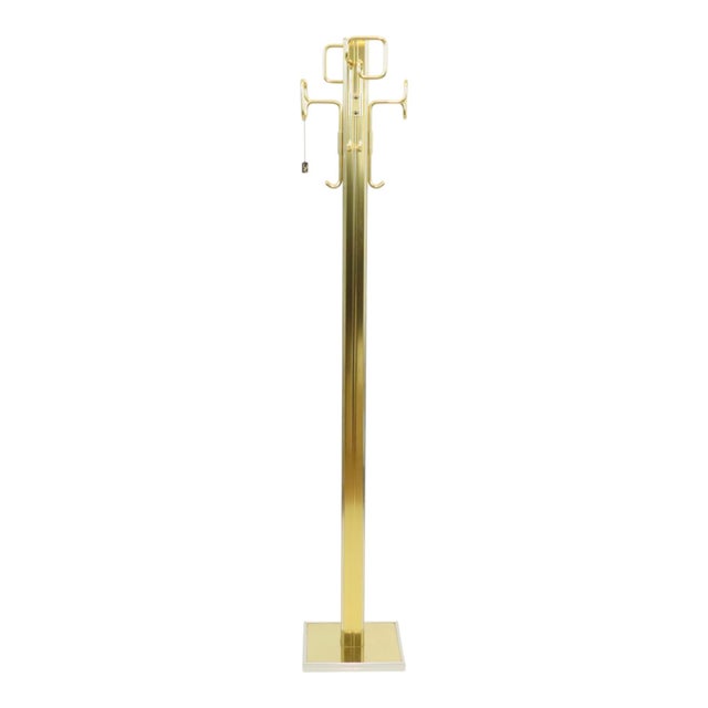 Beautiful vintage freestanding coat rack, made of chrome and brass, a Hollywood Regency design object from the late 1970s...