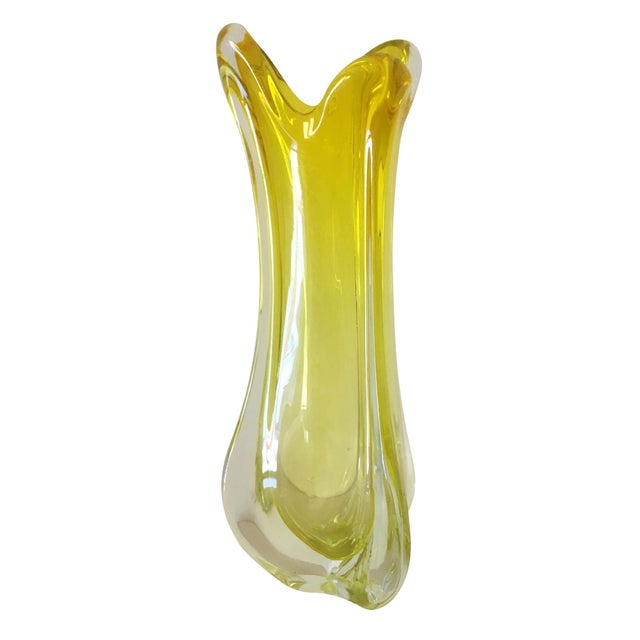 Large submerged glass vase with triangular section in uranium yellow color dating back to the 70s produced by the historic...