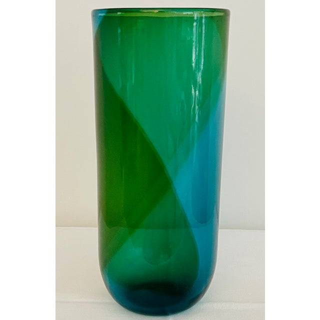 The Tapio Wirkkala Coreani vase from 1965 is a stunning example of mid-century modern design, featuring an abstract...
