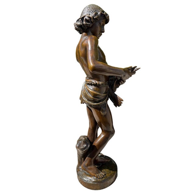 Jean-Louis GREGOIRE (1840-1890) The Birdcatcher, bronze sculpture with a double patina: bronze for the body and brown for...