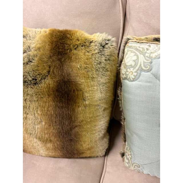 Design Plus Gallery presents the Reversible Faux Fur Embroidered Accent Pillows, a pair showcasing two distinct textile...