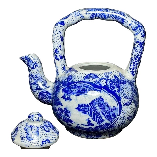 Vintage Chinese Blue and White Porcelain Teapot With Overhead Handle and Mountain Landscape For Sale