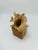 This shell sculpture is a petite yet striking composition that celebrates the natural elegance of the sea. Set atop a...