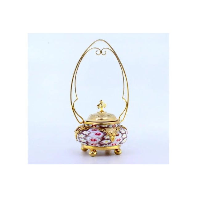 Gold-Plated Silver and Murano Glass Bonbonniere with Floral Motifs Embossing and Spherical Feet, in Very Good conditions....