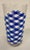 Never used, shiny and bright drinking glasses are wrapped with a blue and white checked patter. The print mimics a napkin...