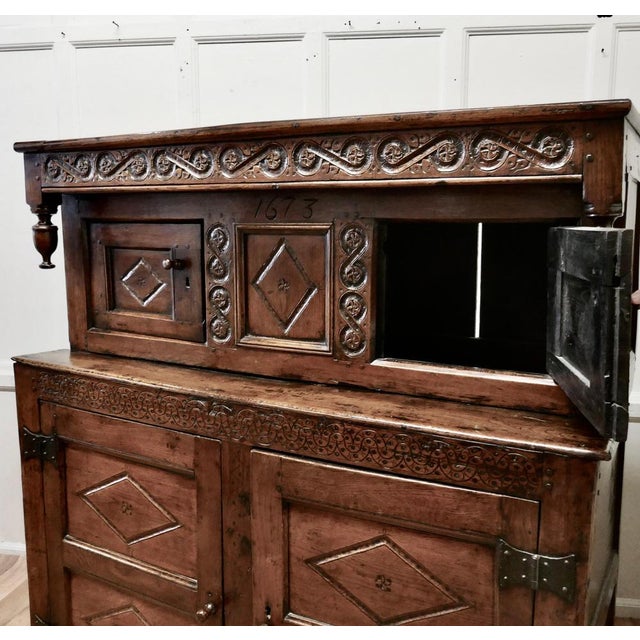 Antique Court Cupboard in Carved Oak, 1673 For Sale - Image 13 of 14